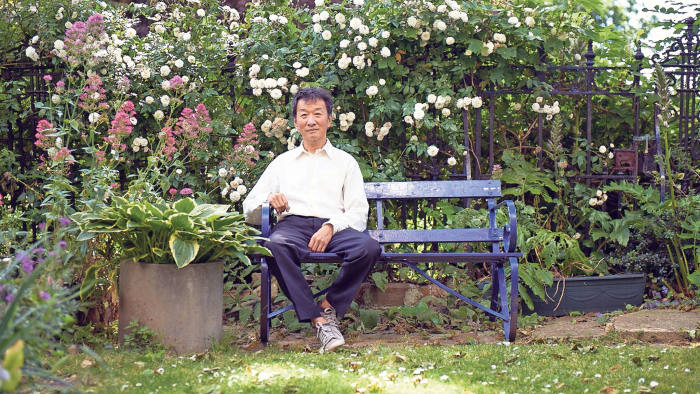 Melvyn Tan in his garden in Notting Hill