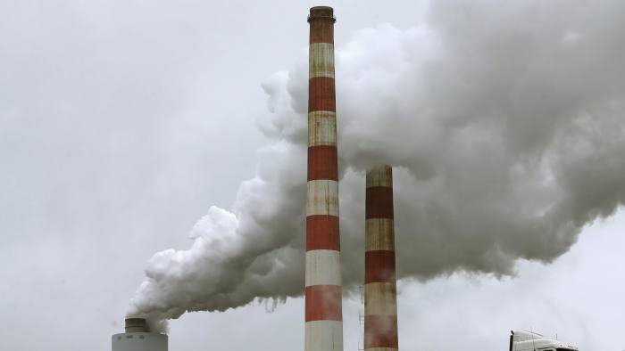 Emissions spew out of a large stack at the coal-fired Morgantown Generating Station in Newburg, Maryland