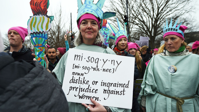 Protesters participate in the Women's March, in Washington, DC, on January 21, 2017. Hundreds of thousands of people flooded US cities Saturday in a day of women's rights protests to mark President Donald Trump's first full day in office. / AFP / Robyn BECK (Photo credit should read ROBYN BECK/AFP/Getty Images)