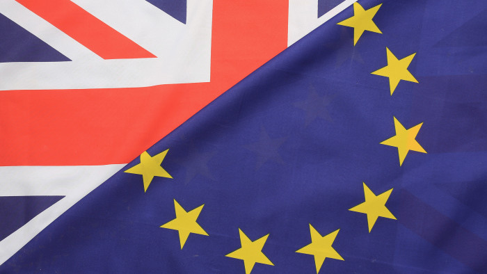 KNUTSFORD, UNITED KINGDOM - MARCH 17:  In this photo illustration, the European Union and the Union flag sit together on March 17, 2016 in Knutsford, United Kingdom. The United Kingdom will hold a referendum on June 23, 2016 to decide whether or not to remain a member of the European Union (EU), an economic and political partnership involving 28 European countries which allows members to trade together in a single market and free movement across its borders for citizens.  (Photo illustration by Christopher Furlong/Getty Images)