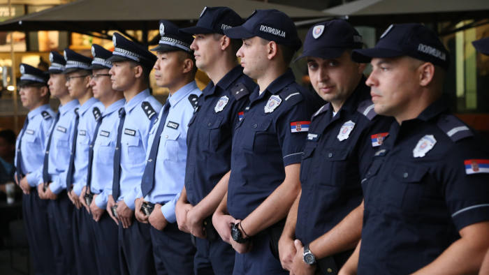 WXX3RP (190918) -- BELGRADE, Sept. 18, 2019 (Xinhua) -- Chinese and Serbian police officers attend a launching ceremony of their first joint patrol in Belgrade, Serbia, Sept 18, 2019. The first joint patrol of Chinese and Serbian policemen was presented to the public in downtown Belgrade on Wednesday. Serbian Interior Minister Nebojsa Stefanovic explained that the police officers will conduct joint patrols at several locations in the city that are considered either tourist attractions or important locations for Chinese citizens in order to make communication easier for them. (Xinhua/Shi Zhongyu)