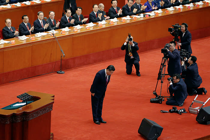 Chinese President Xi Jinping bows before delivering his speech during the opening session of the 19th National Congress of the Communist Party of China at the Great Hall of the People in Beijing, China October 18, 2017. REUTERS/Thomas Peter