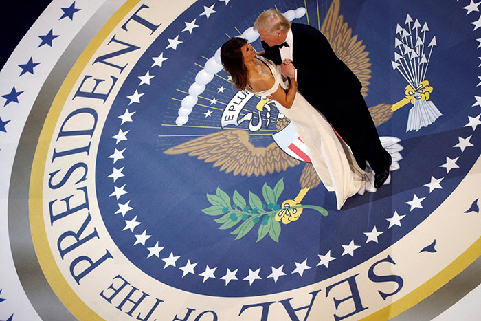 U.S. President Donald Trump and first lady Melania Trump attend the Commander in Chief/Salute to Armed Forces Ball in honor of his inauguration in Washington, U.S. January 20, 2017. REUTERS/Jonathan Ernst TPX IMAGES OF THE DAY - RTSWMDY