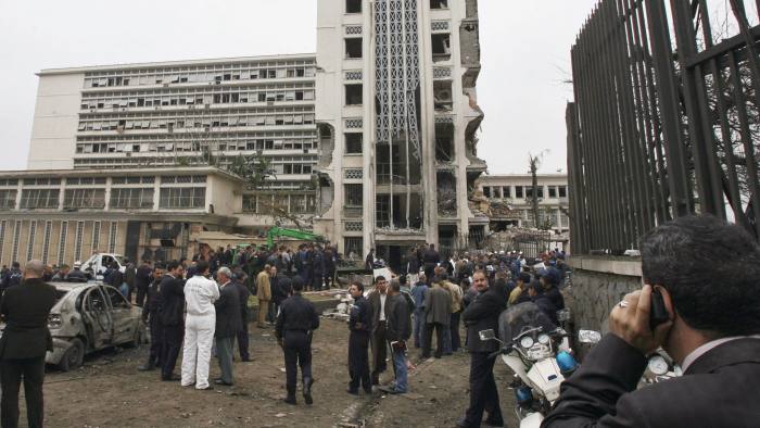 Algiers, ALGERIA: A general view shows Algerian rescuers inspecting damages of the buildings of Prime minister's offices following a suicide car exploded near the Governmental Palace in the center of Algiers City 11 April 2007. At least 23 people were killed and scores injured in a series of car bombs that rocked the Algerian capital, including one that targeted the government headquarters. AFP PHOTO/FAYEZ NURELDINE (Photo credit should read FAYEZ NURELDINE/AFP/Getty Images)
