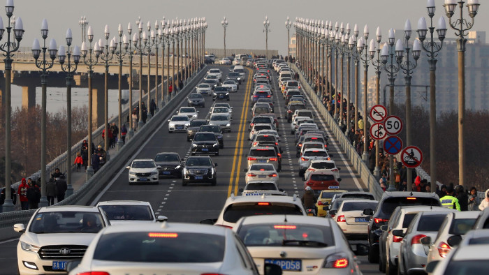 NANJING, CHINA - DECEMBER 29: Vehicles move along the renovated Nanjing Yangtze River Bridge on December 29, 2018 in Nanjing, Jiangsu Province of China. The double-decked road-rail truss bridge reopened to road traffic Saturday after a 26-month renovation. (Photo by Yang Bo/China News Service/VCG via Getty Images)