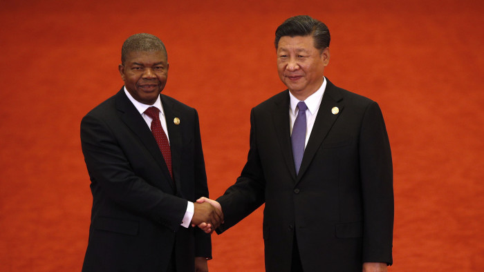 BEIJING, CHINA - SEPTEMBER 03: Angola's President Joao Lourenco, left, shakes hands with Chinese President Xi Jinping during the Forum on China-Africa Cooperation held at the Great Hall of the People on September 3, 2018 in Beijing, China. (Photo by Andy Wong - Pool/Getty Images)