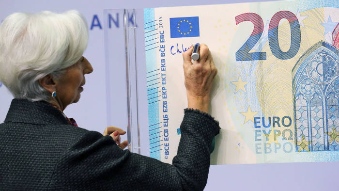 Mandatory Credit: Photo by ARMANDO BABANI/EPA-EFE/Shutterstock (10486301c) European Central Bank (ECB) President Christine Lagarde signs the new 20 Euro banknote in Frankfurt am Main, Germany, 27 November 2019. The signing of new euro banknotes is a traditional act that takes place at the beginning of each ECB presidency. European Central Bank (ECB), Frankfurt, Germany - 27 Nov 2019