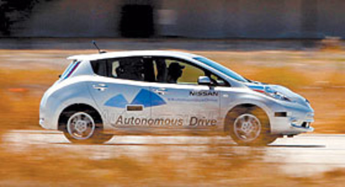 The Nissan Autonomous Drive Leaf electric vehicle is test driven during the Nissan Motor Co. 360 event in Irvine, California, U.S., on Tuesday, Aug. 27, 2013