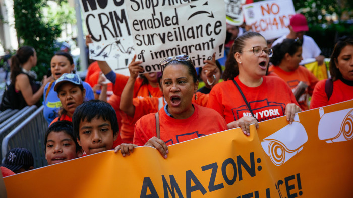 NEW YORK, NY - JULY 15: Protestors march to a building where Amazon owner Jeff Bezos owns property on July 15, 2019 in New York City. The protest, raising awareness of Amazon facilitating ICE surveillance efforts, coincides with Amazon's Prime Day, when Amazon offers discounts to Prime members. (Photo by Kevin Hagen/Getty Images)