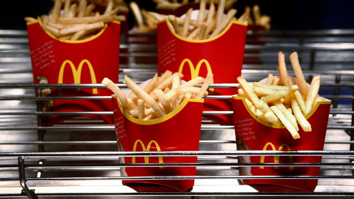 Cartons of McDonald's french fries sit at a restaurant in London, on Monday, Feb. 1, 2010