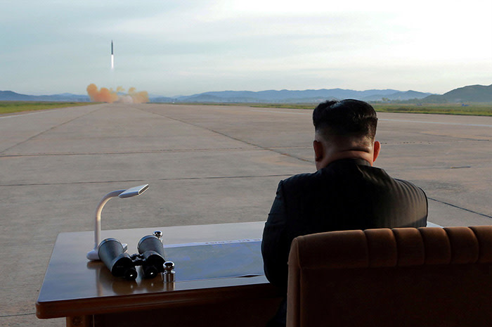North Korean leader Kim Jong Un watches the launch of a Hwasong-12 missile in this undated photo released by North Korea's Korean Central News Agency (KCNA) on September 16, 2017. KCNA via REUTERS ATTENTION EDITORS - THIS PICTURE WAS PROVIDED BY A THIRD PARTY. REUTERS IS UNABLE TO INDEPENDENTLY VERIFY THE AUTHENTICITY, CONTENT, LOCATION OR DATE OF THIS IMAGE. NO THIRD PARTY SALES. SOUTH KOREA OUT. TPX IMAGES OF THE DAY - RC1F523CC770