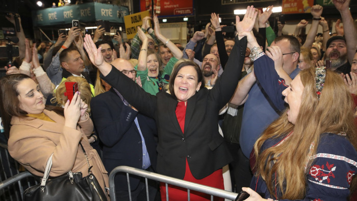 Sinn Fein leader Mary Lou McDonald celebrates with supporters after topping the poll in Dublin central at the RDS count centre in Dublin, Ireland, Sunday, Feb. 9, 2020. (AP Photo/Peter Morrison)
