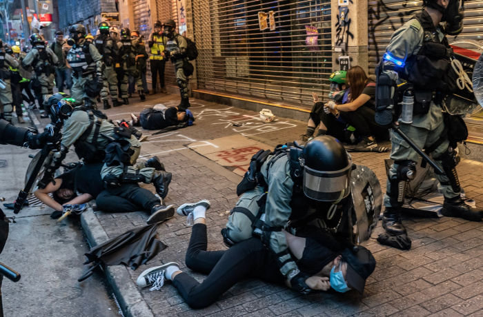 ***BESTPIX*** HONG KONG, CHINA - OCTOBER 6: Pro-democracy protesters are arrested by police during a clash at a demonstration in Wan Chai district on October 6, 2019 in Hong Kong, China. Hong Kong's government invoked emergency powers on Friday to introduce an anti-mask law which bans people from wearing masks at public assemblies as the city remains on edge with the anti-government movement entering its fourth month. Pro-democracy protesters marked the 70th anniversary of the founding of the People's Republic of China in Hong Kong as one student protester was shot in the chest in the Tsuen Wan district during with mass demonstrations across Hong Kong. Protesters in Hong Kong continue to call for Chief Executive Carrie Lam to meet their remaining demands since the controversial extradition bill was withdrawn, which includes an independent inquiry into police brutality, the retraction of the word riot to describe the rallies, and genuine universal suffrage, as the territory faces a leadership crisis. (Photo by Anthony Kwan/Getty Images)