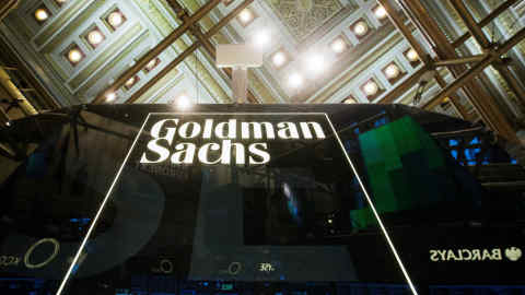 A Goldman Sachs sign is seen above the floor of the New York Stock Exchange shortly after the opening bell in the Manhattan borough of New York January 24, 2014. REUTERS/Lucas Jackson/File Photo - S1BETERLOVAA