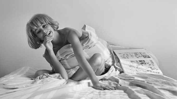 Actress Mireille Darc Laughing in Bed (Photo by Alain Dejean/Sygma via Getty Images)