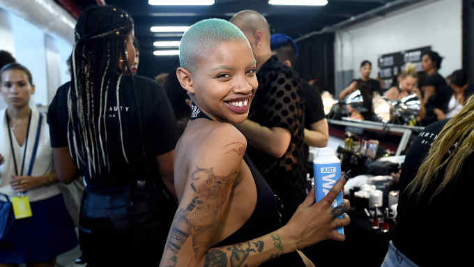 BROOKLYN, NY - SEPTEMBER 12: Model Slick Woods poses backstage for the Savage X Fenty Fall/Winter 2018 fashion show during NYFW at the Brooklyn Navy Yard on September 12, 2018 in Brooklyn, NY. (Photo by Ilya S. Savenok/Getty Images for Savage X Fenty )