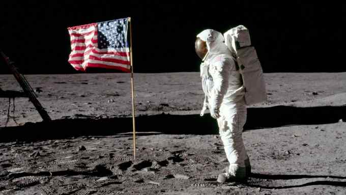Astronaut Buzz Aldrin, lunar module pilot for Apollo 11, poses for a photograph beside the deployed United States flag during an extravehicular activity (EVA) on the moon, July 20, 1969. The lunar module (LM) is on the left, and the footprints of the astronauts are visible in the soil. Neil Armstrong/NASA/Handout via REUTERS ATTENTION EDITORS - THIS IMAGE HAS BEEN SUPPLIED BY A THIRD PARTY
