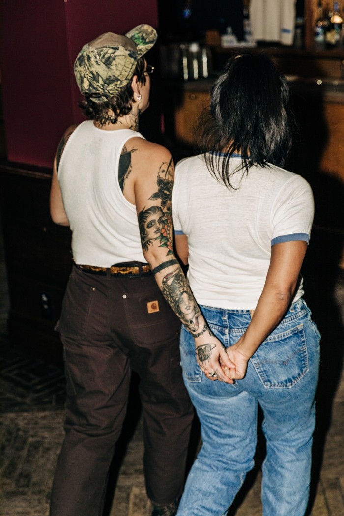 A couple “two-stepping” at a Stud Country line dance at Georgia Room
