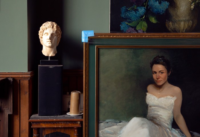 A portrait of a woman in a wedding dress by Hayes, alongside a reproduction of an Alexander the Great bust by Leochares