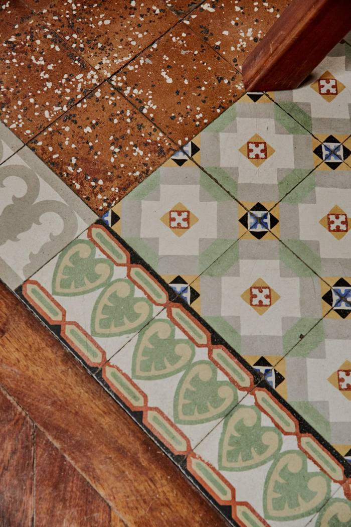 The house’s original tiles have been reorganised into a modern patterned floor