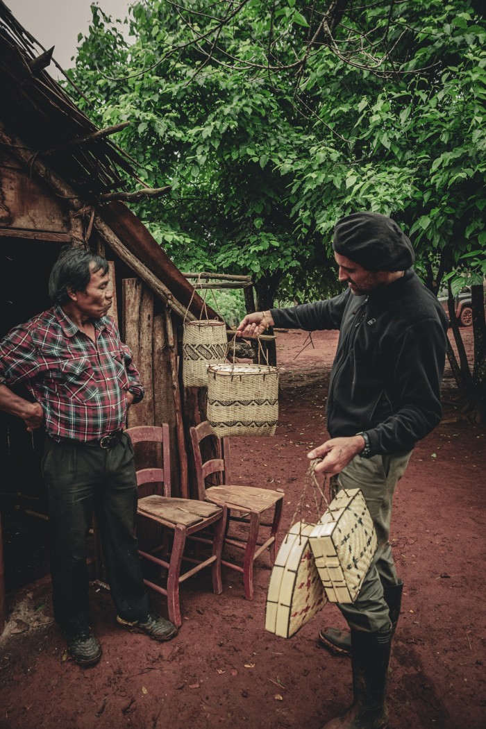 A Guarani chief showing his work in Misiones