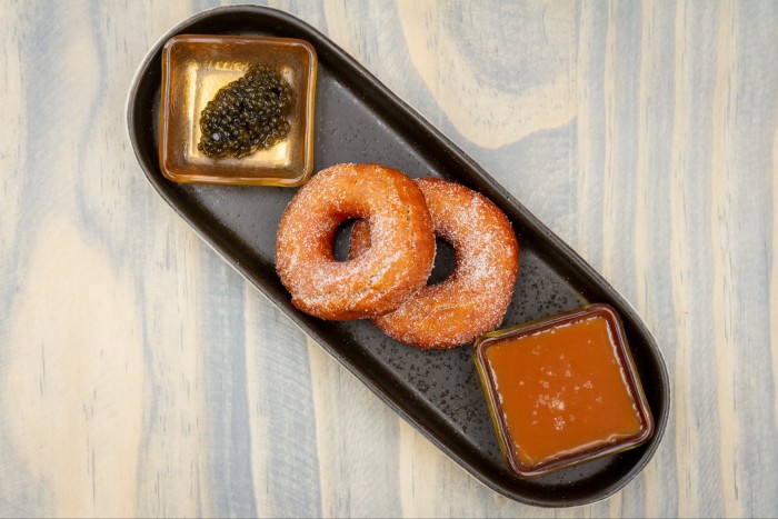 Rye doughnuts with caramel and private-label caviar at Birch & Rye