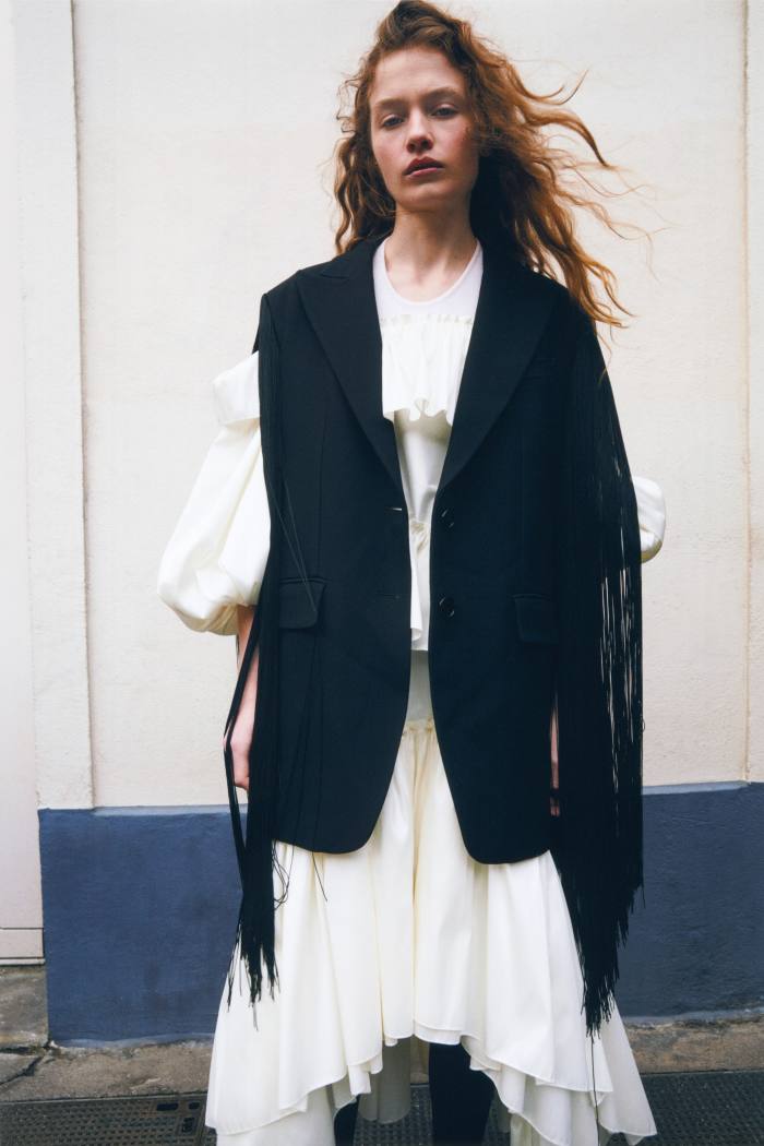 Michael Kors Collection double-crepe fringe jacket dress, £2,355. Simone Rocha taffeta ruffle dress, POA. Wolford 50 denier tights, £35. Vintage wool tank, stylist’s own