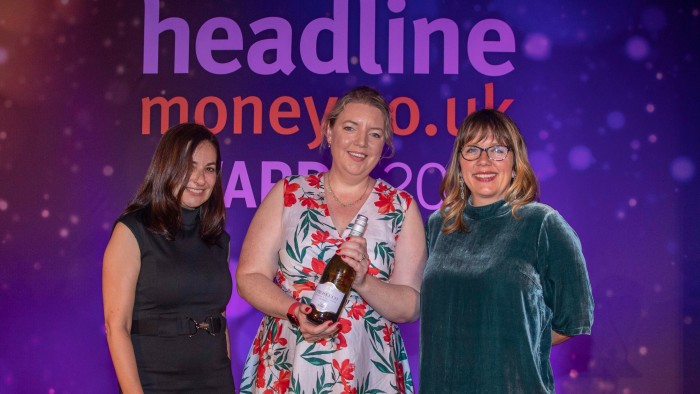 Claer Barrett collects her trophy from Varda Bachrach, head of communications at TipRanks, and awards host Kerry Godliman