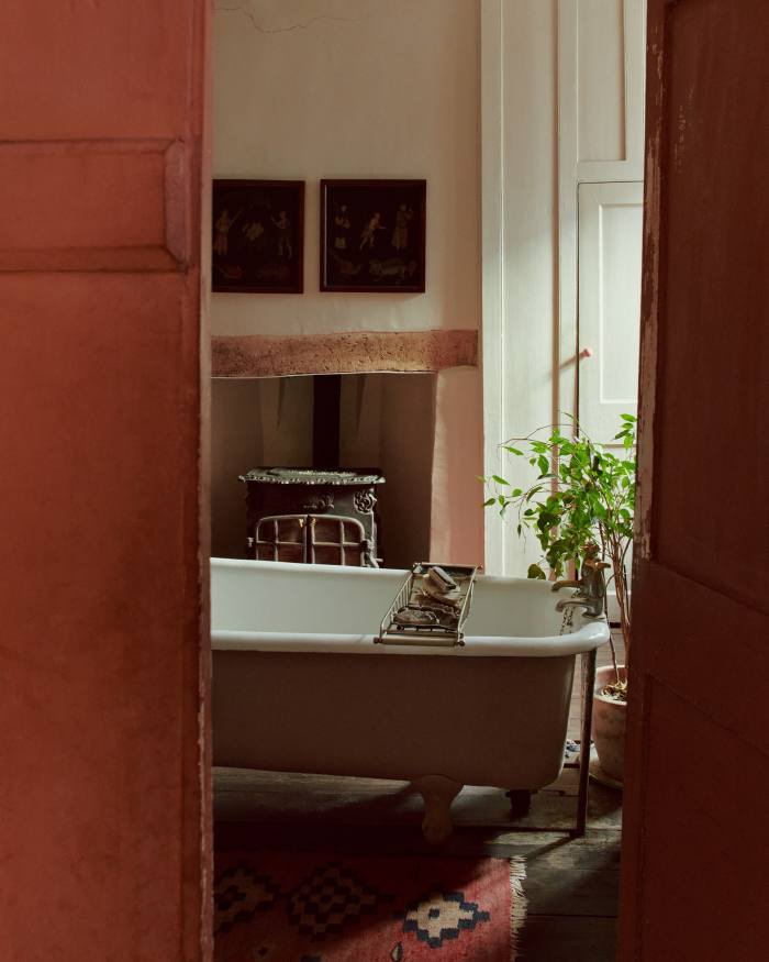The Pink Bathroom, with two 19th-century Japanese collages on the wall