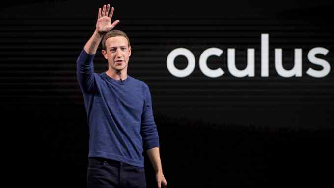 Mark Zuckerberg waving to a crowd