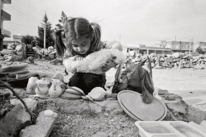 A photograph by Sevin of her sister playing outside