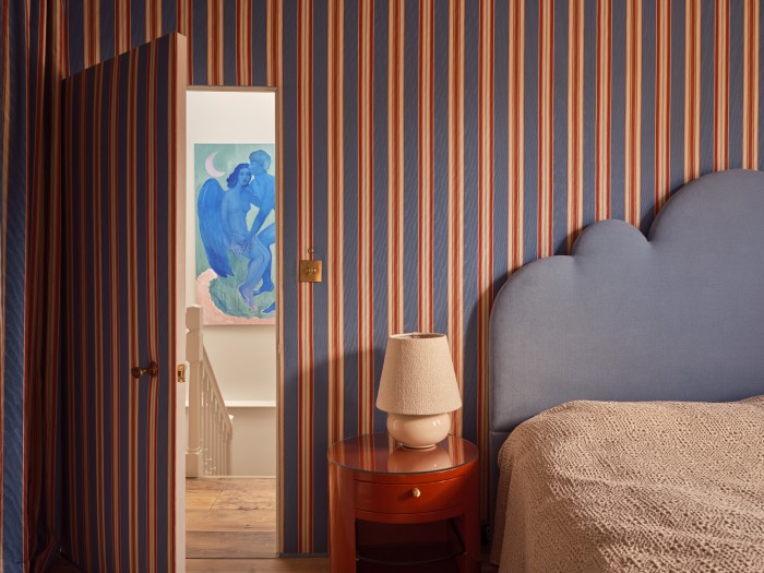 Bespoke Naturalmat bed and cloud headboard in the guest bedroom. Just seen is Island Sanctuary for Two, 2022, by Amy Beager, purchased from Grove Collective