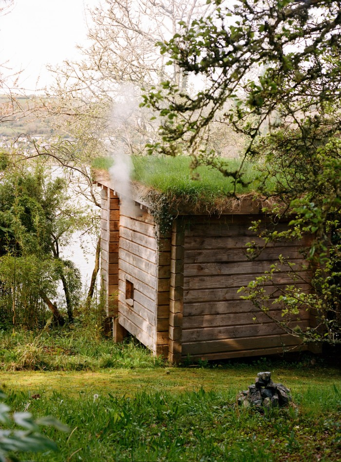 D’Ornellas’s sauna is made of Douglas fir standing on traditional Staddle stones, with a living roof