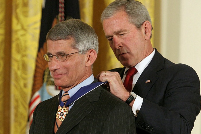 Receiving the Presidential Medal of Freedom from George W Bush in 2008