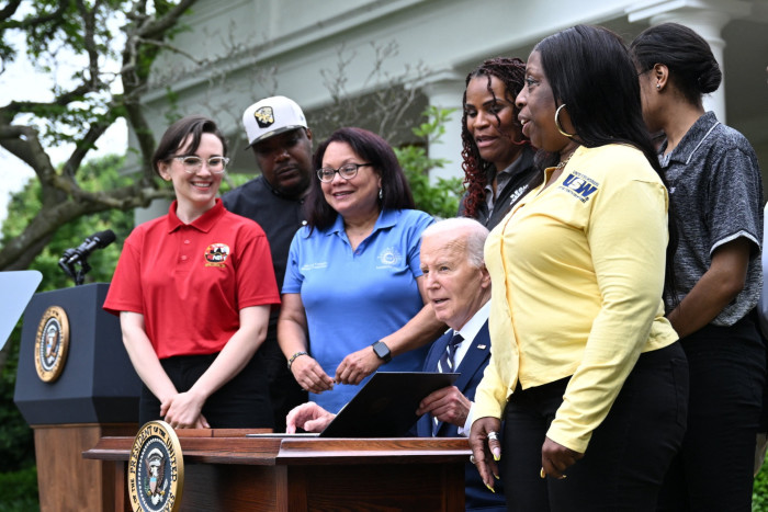 Joe Biden with union members last month as the president approved a rise in tariffs on Chinese-made goods