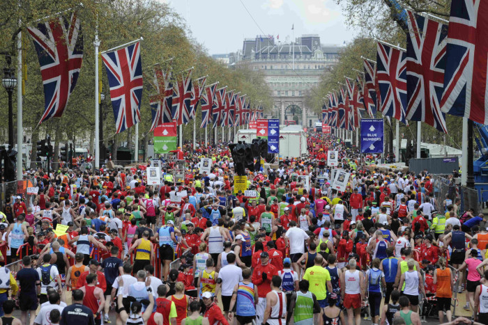Competitors make their way from the finish area at the 2010 London Marathon