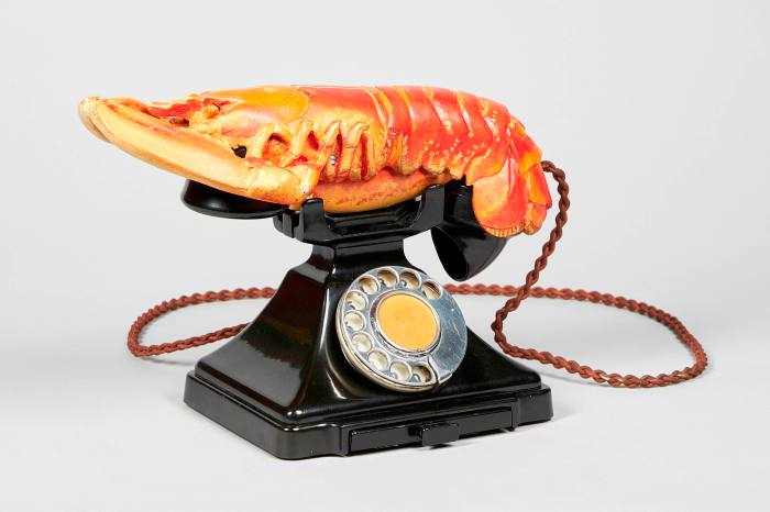 Exactly what it sounds like: a lobster on top of the received of an old-fashioned telephone