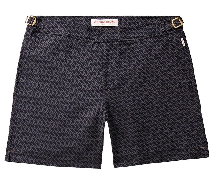 Dark shorts with small grey pattern and gold-coloured buckets at the waist