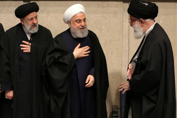 From left, Raisi, then-president Hassan Rouhani and Ayatollah Ali Khamenei at a memorial for slain military officer Qassem Soleimani in 2020