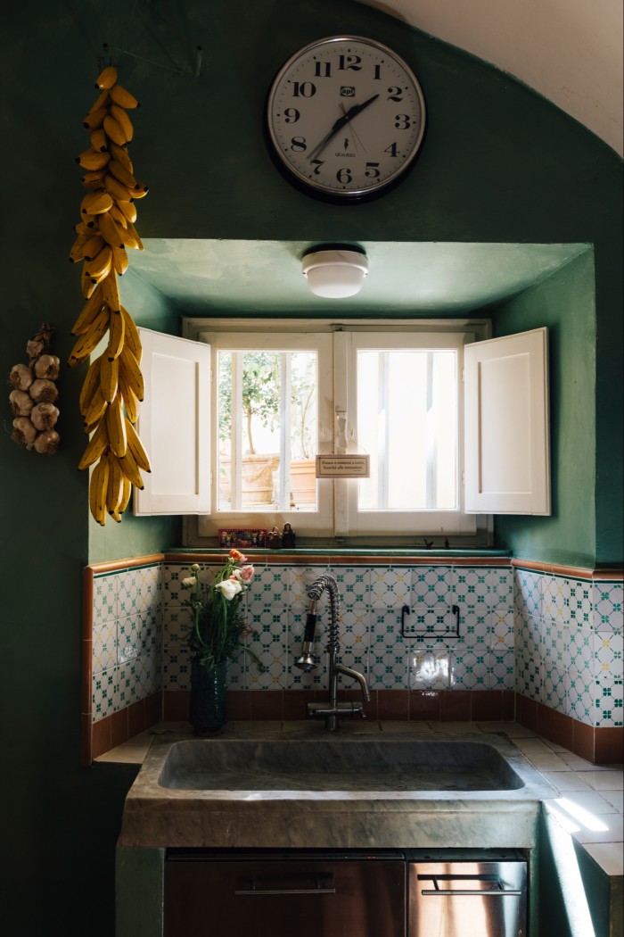 Bini’s kitchen sink with vintage marble basin and tiles