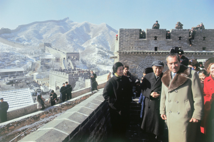Former US president Richard Nixon stands on the Great Wall of China in 1972, after Beijing normalised relations with most western nations and foreign scholars could visit the country frequently 