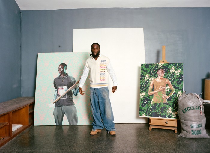 Dior Men cashmere-mix sleeveless V-neck, £1,100. Jacquemus cotton shirt, £330. Sankuanz denim trousers, £261. Timberland leather Premium Winter boots, £215. Artworks in progress by Kehinde Wiley