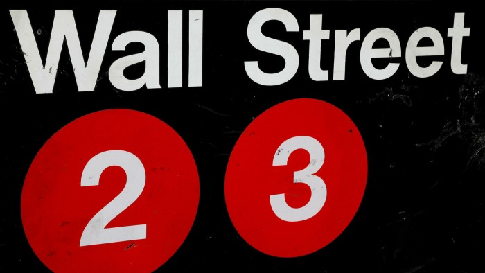 A sign for the Wall Street subway station in New York’s financial district