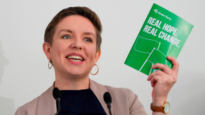 Green party co-leader Carla Denyer holds up a manifesto as she speaks at the party’s general election manifesto launch on Wednesday