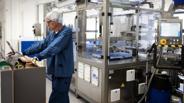 An employee monitors operations at the Novo Nordisk production facility in Hillerod, Denmark