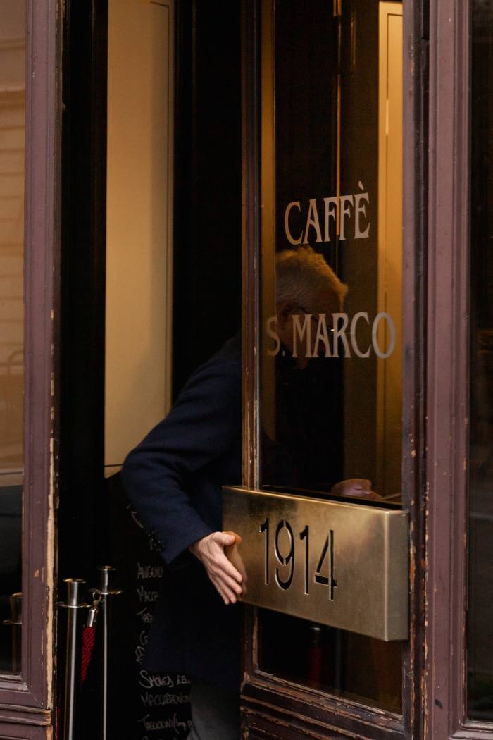 Entering Caffè San Marco, with its founding date on the door…