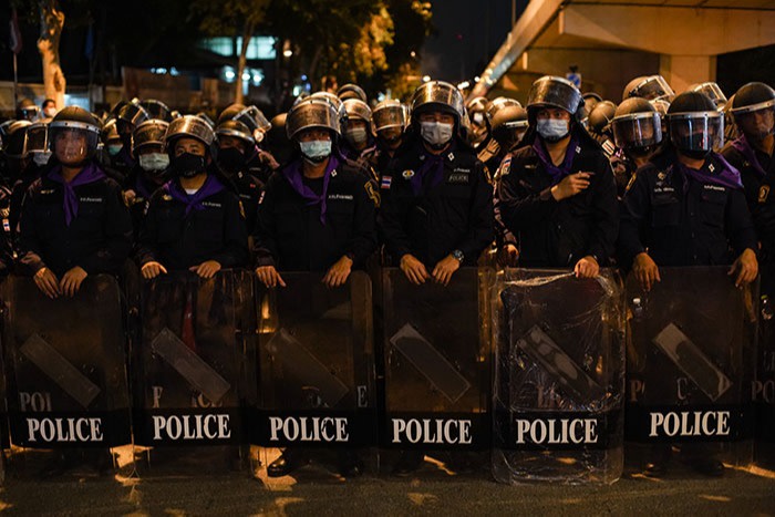 Police at a demonstration held on October 21. The students have taken pains to keep the protests peaceful and ‘festival-like’