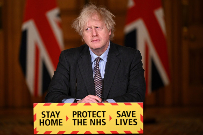 Boris Johnson hosts a press conference inside Downing Street during the Covid-19 pandemic