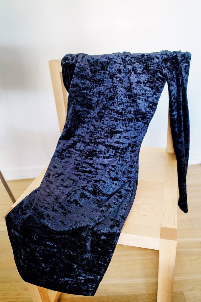 Her new Balenciaga dress on her Donald Judd chair