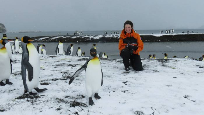 Liz Thomas, British climate scientist, with penguins